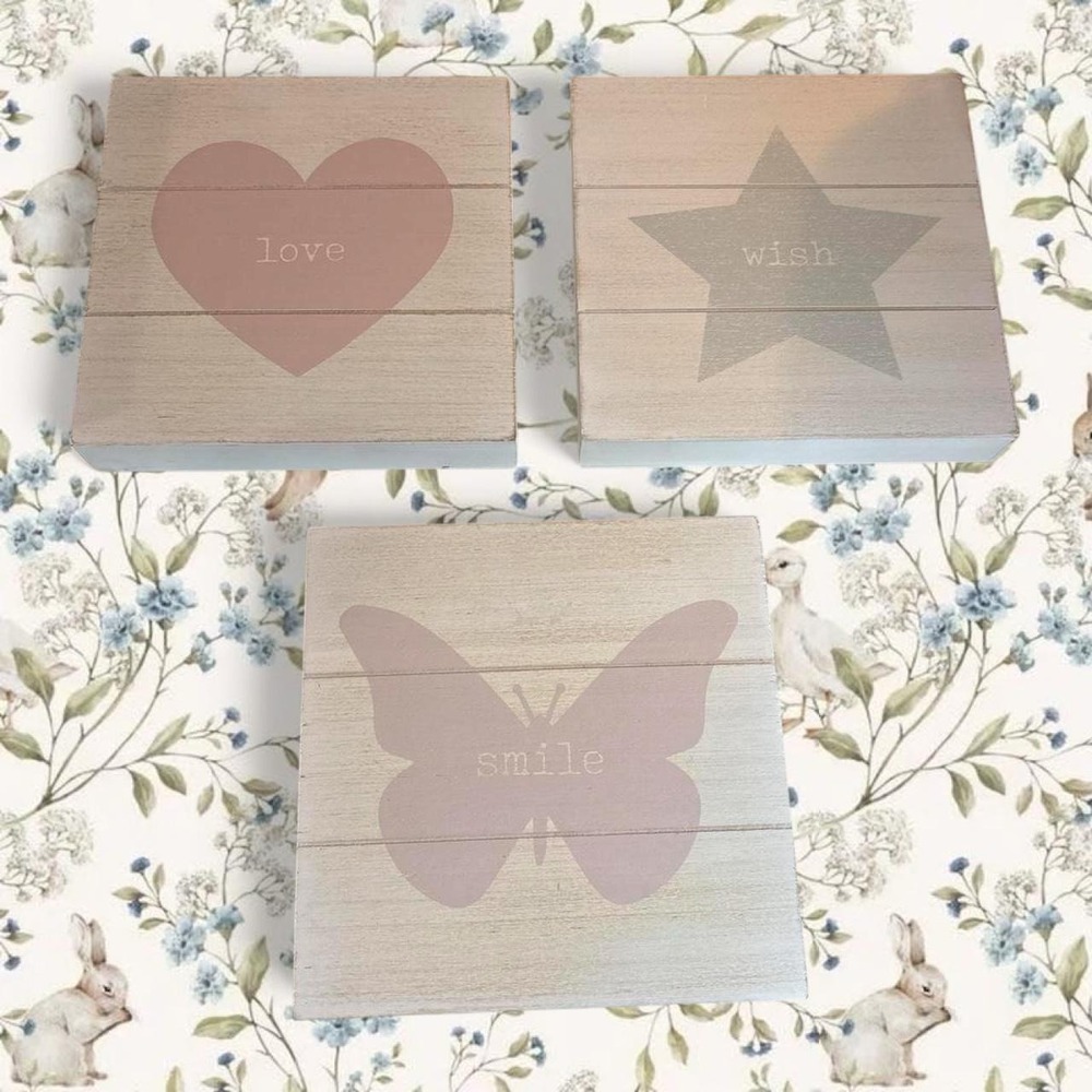 Pink and white wooden nursery plaques with cute designs